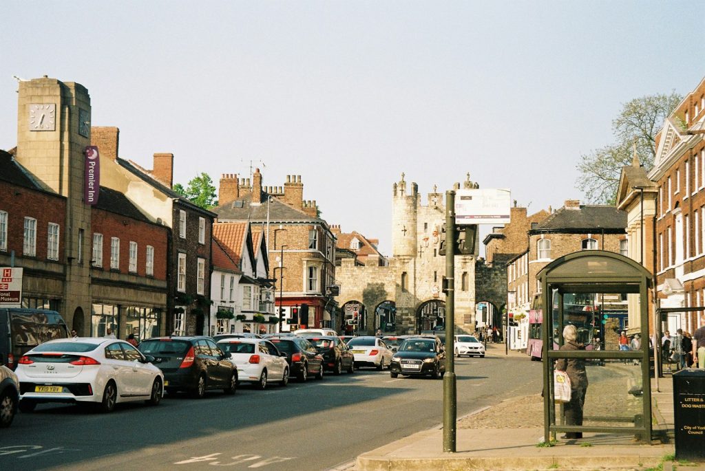 a city street filled with lots of traffic